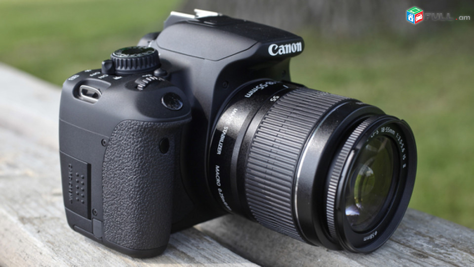 Canon 650D DLSR camera with 18-55mm Lens.