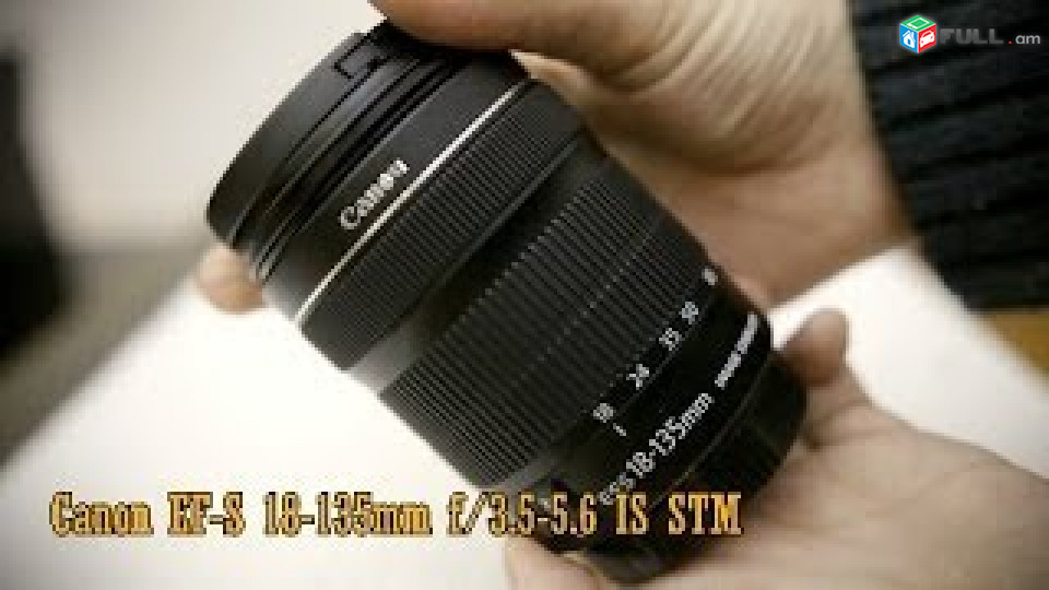 Canon EF-S 18-135mm f/3.5-5.6 IS STM+hood.