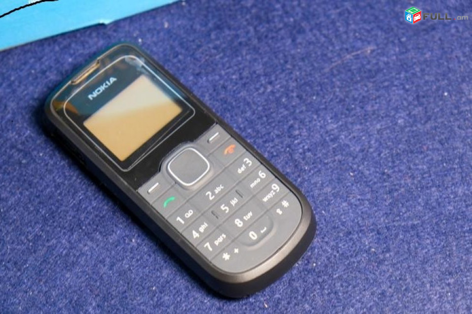 Nokia 1202 նոր հեռախոս, բարակ և հարմարավետ։