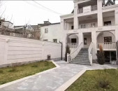 IN0677  Չորս հարկանի քարե տուն Արմեն Տիգրանյանի փողոցում Քանաքեռ Զեյթունում